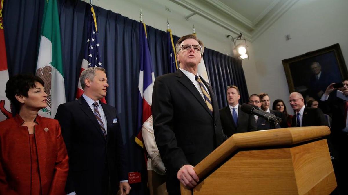 Lt. Gov. Dan Patrick, backed by other legislators and supporters of Senate Bill 6, talks to the media Monday at the Texas Capitol in Austin.