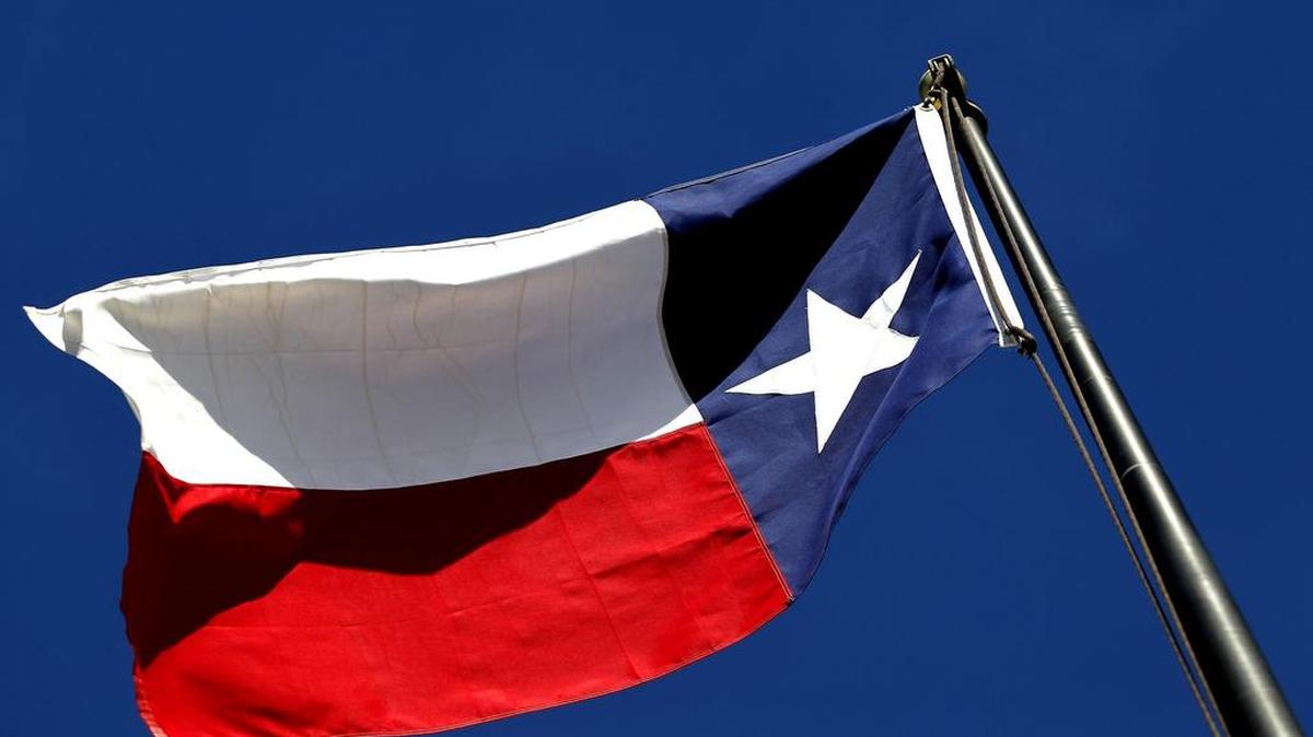 A large Texas flag flying.