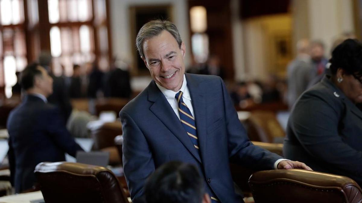 Texas House Speaker Joe Straus, R-San Antonio, talks with fellow lawmakers April 19 in Austin.