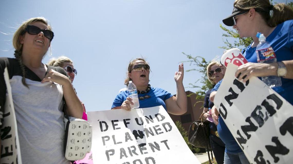 Protesters outside Planned Parenthood in Fort Worth in 2015 called for the defunding of the organization.