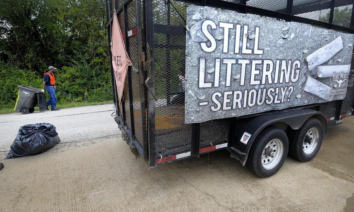 Marcus White, Litter Abatement Code Compliance, recently picking up litter along Meadbrook Drive in Fort Worth.