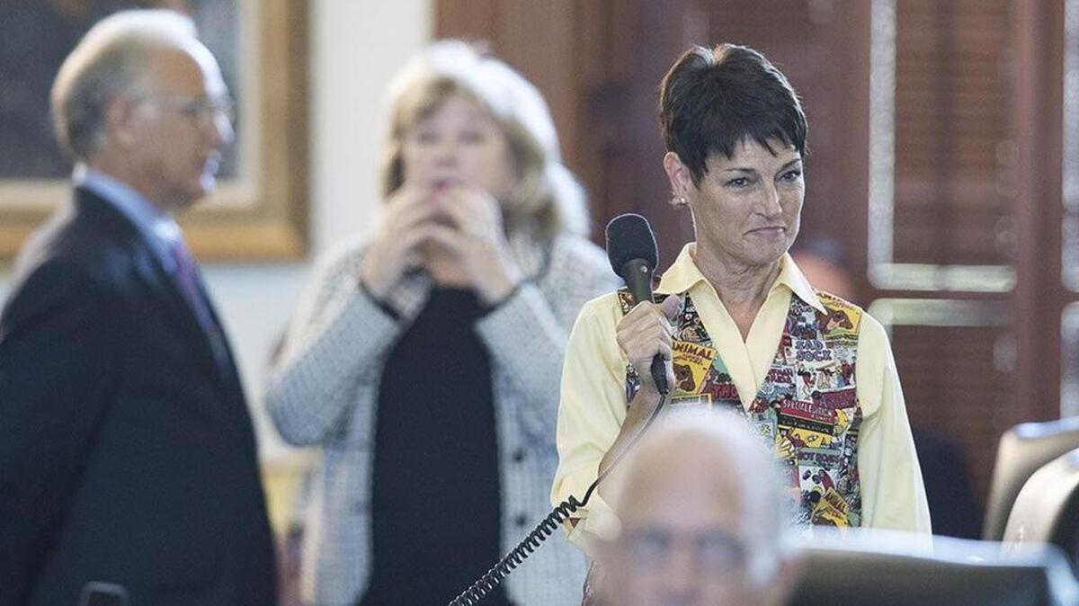 State Sen. Donna Campbell, R-New Braunfels, answers questions from Sen. Carlos Uresti, D-San Antonio, about Senate Bill 6, the municipal annexation bill that would require citizen elections for cities to annex adjacent property, on Sunday, Aug. 13.