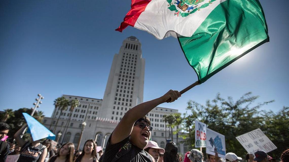 The push is on in Texas to ban “sanctuary cities,” but elsewhere around the country, local officials are digging in to protect them. Students march on downtown Los Angeles after walking out of class Nov. 14, 2016 in Los Angeles. Demonstrators demanded local politicians to declare L.A. County a sanctuary. (Brian van der Brug/Los Angeles Times/TNS)
