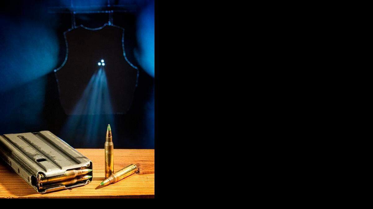 
Photo illustration of the green tip 5.56 ammo that the Bureau of Alcohol, Tobacco, Firearms and Explosives is considering banning for its armor piercing ability. 
