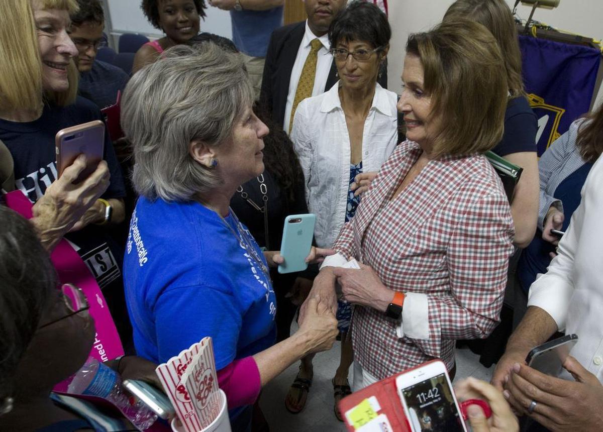 U.S. House Democratic leader Nancy Pelosi meets Pam Dunham, Tarrant County Democratic Women's Club, at a Resistance Summer rally in Dallas.