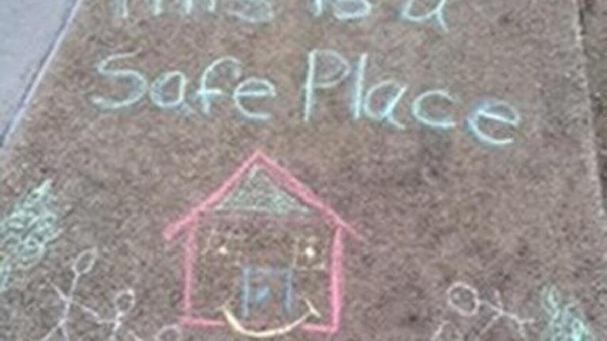 Children use chalk to display their feelings at Alliance For Children, a child advocacy center serving Tarrant County.