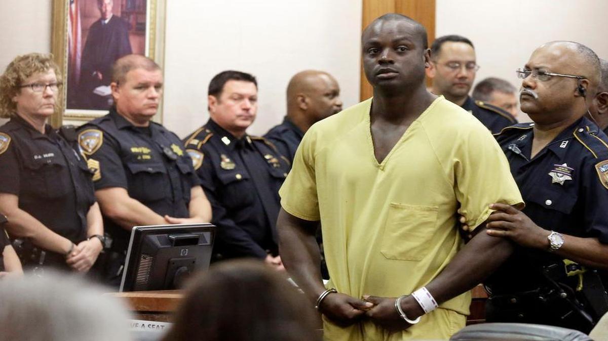 
Shannon J. Miles, 30, is escorted from a Harris County court hearing Monday. Miles is accused of capital murder in the ambush and slaying of Harris County sheriff’s Deputy Darren Goforth. 
