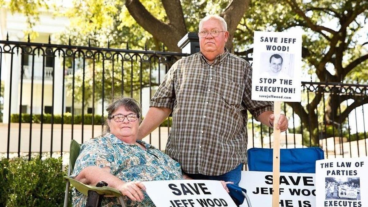 Mitzie and Danny Wood, parents of Jeff Wood, at a rally in July 2016 at the Governor's mansion. Their son, Jeff, was sent to death row under the controversial law of parties statute.