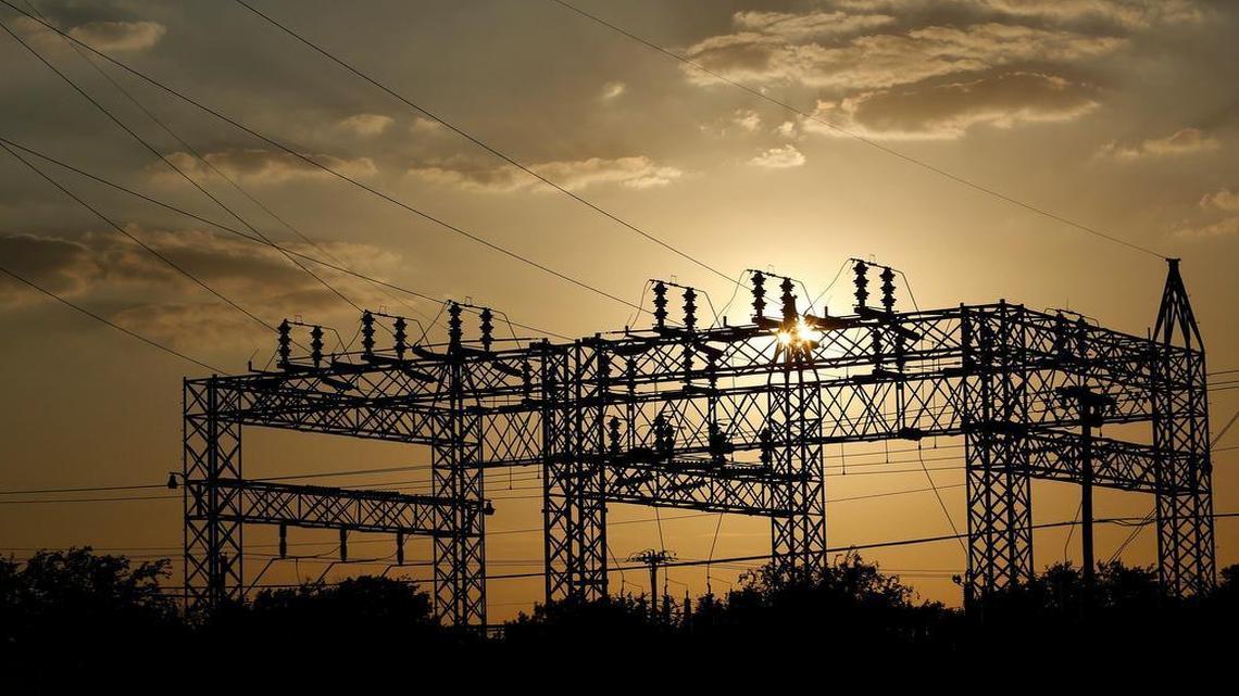 File photo. Power lines at sunset in south Fort Worth. Utilities providing the power are receiving big federal tax breaks with new legislation signed in December 2017. There are efforts to ensure they pass savings on to consumers.