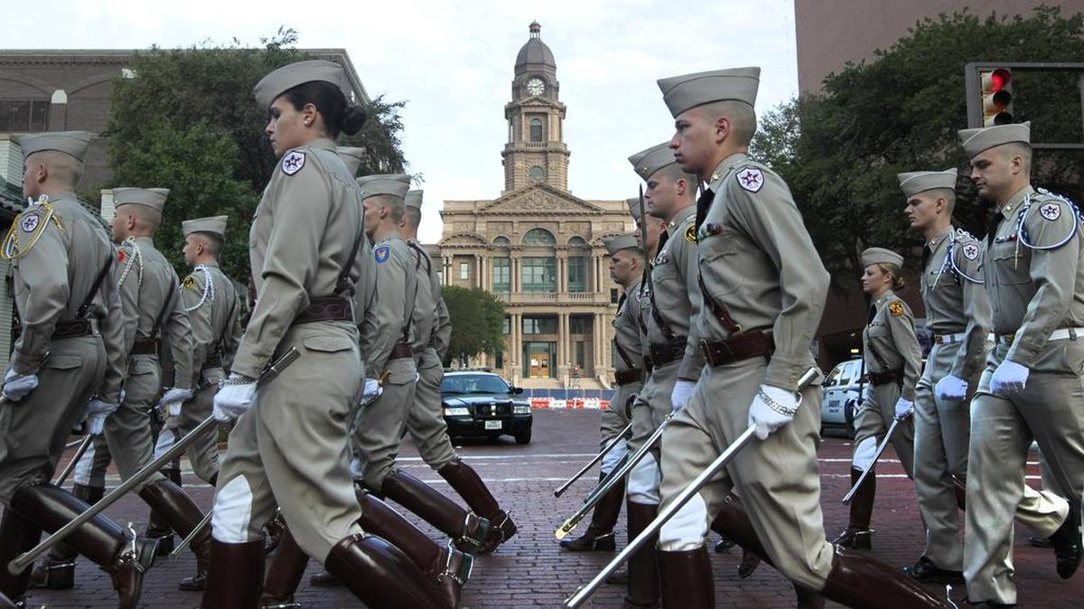 The Texas A&M Corps of Cadets march past the Tarrant County Courthouse in downtown Fort WorthSept. 27, 2014.
