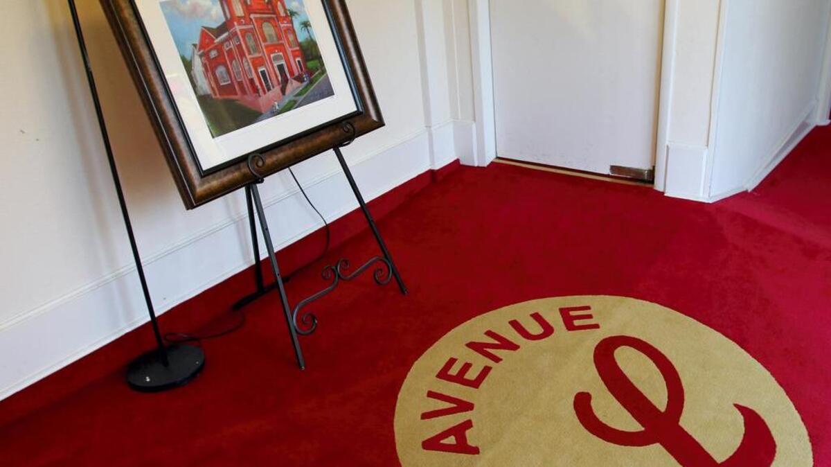 
In this Aug. 14 photo, a painting of Avenue L Baptist Church by artist Ted Ellis is is displayed in the entryway to the church. The island church, the oldest African-American church in Texas, is celebrating its 175th anniversary this year. 
