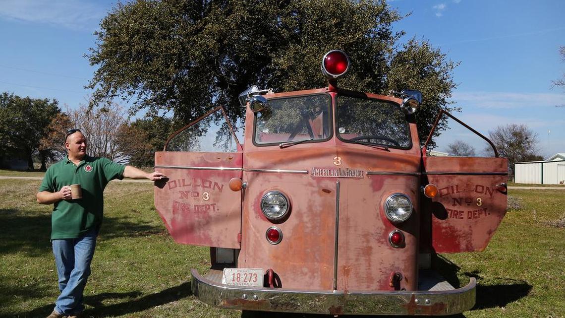 Waco firefighter Larry Denman stands with the 1956 American LaFrance firetruck that was donated to his department’s Honor Guard in Whitney. The old engine, once restored, will be used for parades and funerals.