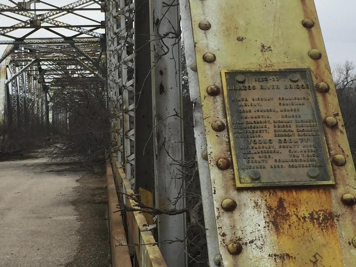 A plaque on the old U.S. 380 bridge shows that it was built in 1932-33.