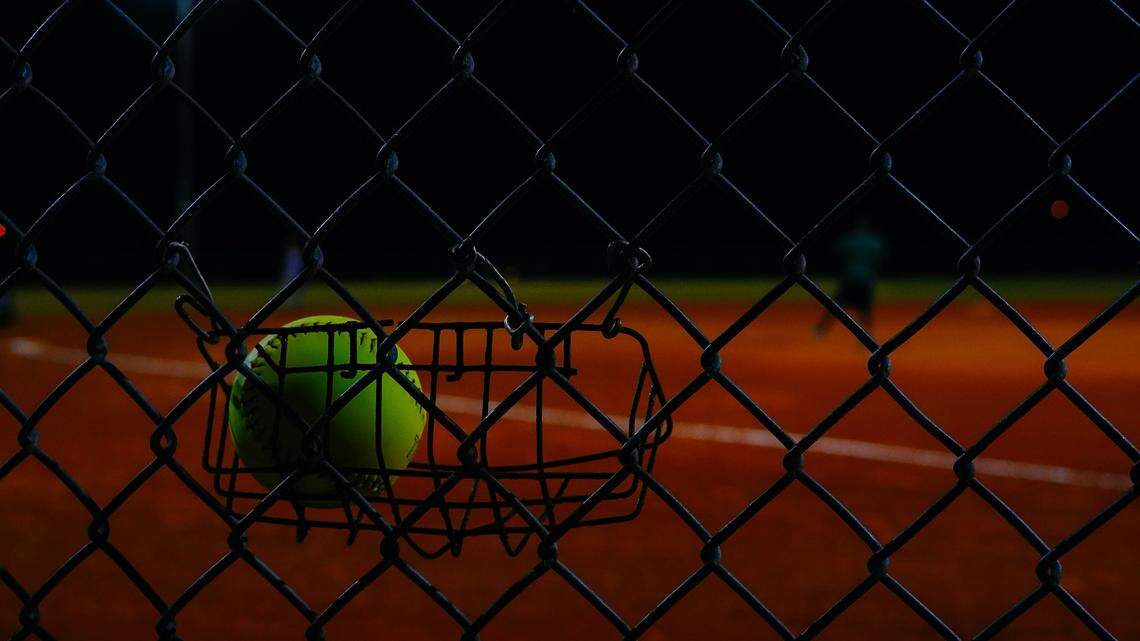 Two softball coaches at Prosper High School in Texas were arrested on charges of failing to report allegations that three students on their team were sexually assaulted by another player, police say.