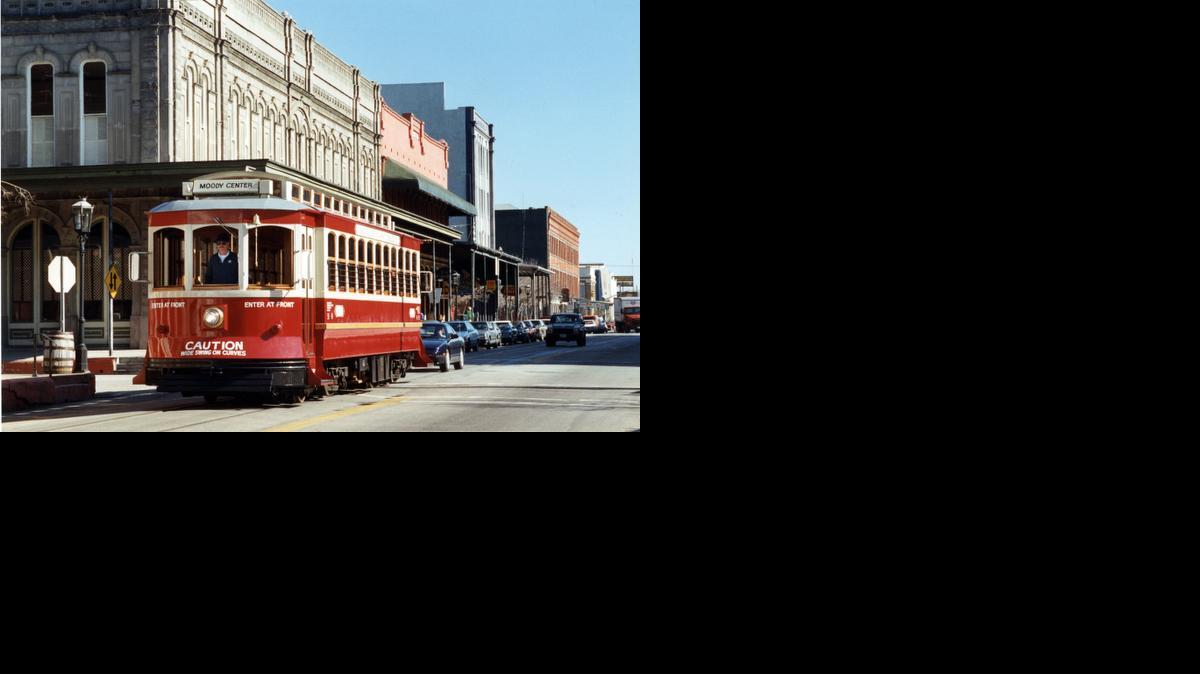 
In this Jan. 10, 1990 photo, a Galveston Trolley goes down Strand Avenue near 22nd Street. The island city’s trolley cars were destroyed during Hurricane Ike.
