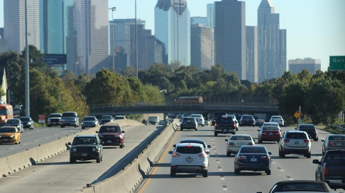 Cars approach downtown Houston on southbound Interstate 45.