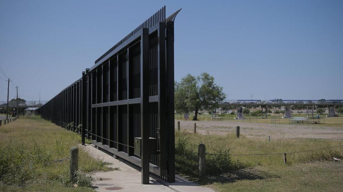 The border fence stays open at this spot so people can use the park and river in Eagle Pass, along the Rio Grande. A woman became stranded in the Rio Grande river while attempting to cross it with her three children, border agents said.