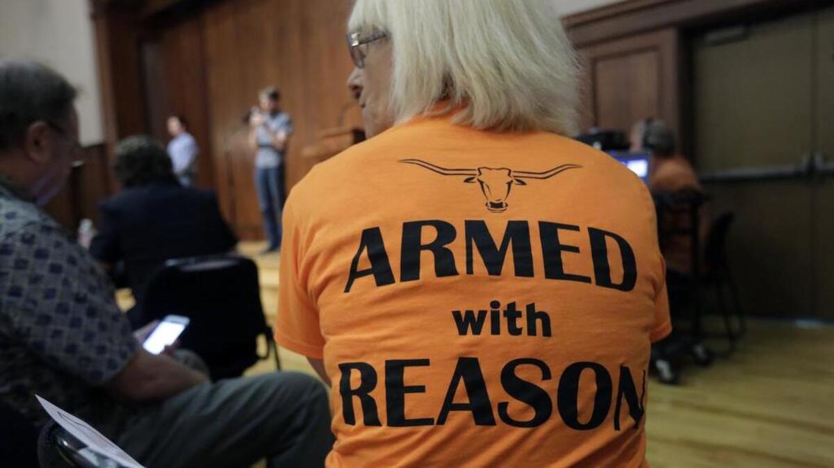 FILE PHOTO: In this Wednesday, Sept. 30, 2015, file photo, professor Ann Cvetkovich waits to speak during a public forum as a special committee studies how to implement a new law allowing students with concealed weapons permits to carry firearms into class and other campus buildings, which will take effect in August 2016, in Austin, Texas. Despite a federal law requiring them to have detailed emergency plans, colleges across the country vary widely in how they prepare for campus shootings and inform their staffs and students. (AP Photo/Eric Gay)