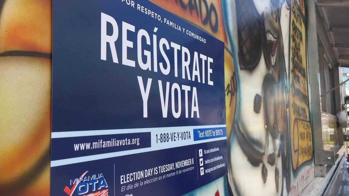 A registration poster greets customers at Taqueria Las Glorias in Houston.