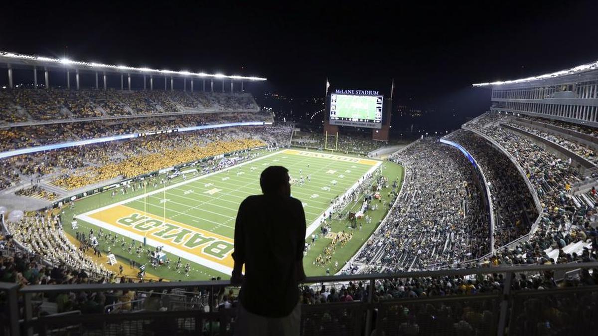 A fan looks on as Baylor and Northwestern State play Sept. 2 in Waco. Baylor University regents left a meeting Friday saying they were committed to improving transparency in the wake of the football program sexual assault scandal but offered no specifics.