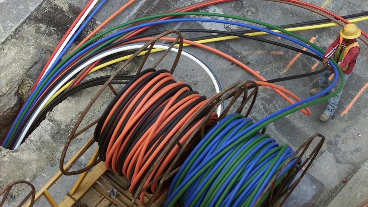 The theft ring focused on taking fiber optic cable, officials say. Nine people have been arrested. This is a file photo of cable lines.
