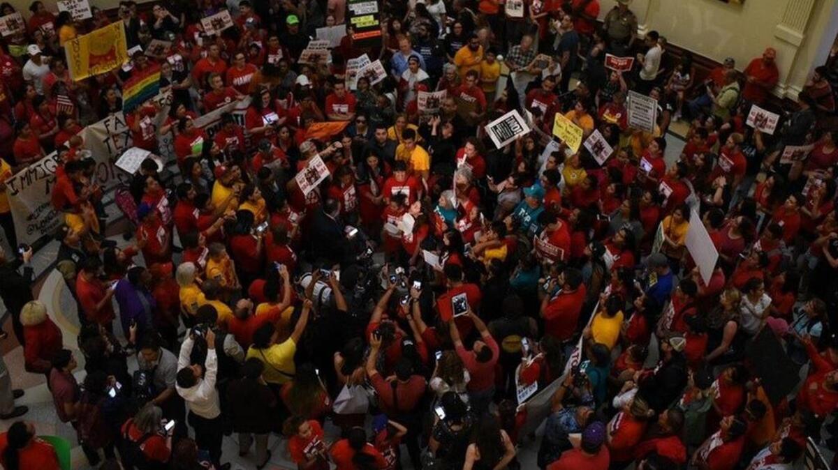 The floor of the state Capitol is packed with protesters opposed to Senate Bill 4, the "sanctuary cities" bill, on May 29, 2017.