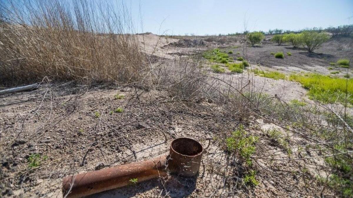 The land is sinking three-fourths of an inch every month around this abandoned well outside of Imperial in Pecos County, and huge cracks have opened in the area. The Texas Department of Transportation paid most of the $315,000 bill to plug the well in 2009 and has spent at least $1 million fixing a nearby farm-to-market road.