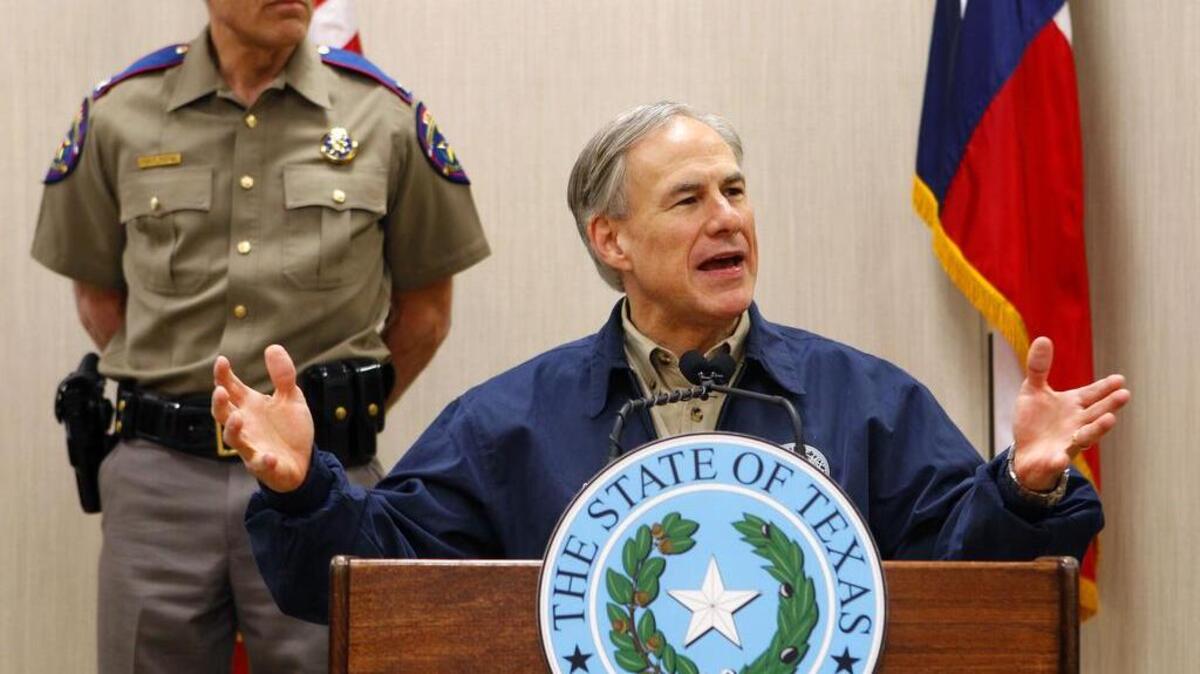 
Texas Gov. Greg Abbott talked about his border security plan in March 2015 in Weslaco. At left is DPS Director Steve McCraw. 
