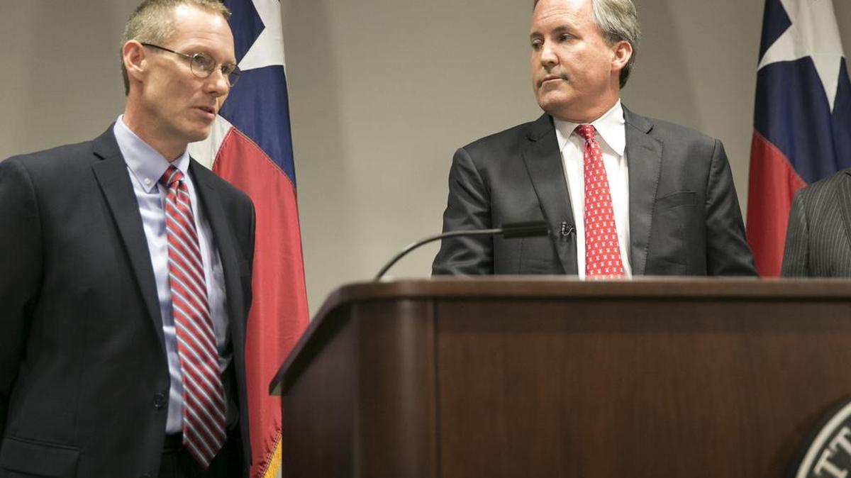Harrold school Superintendent David Thweatt, left, and Texas Attorney General Ken Paxton speak at a news conference Wednesday, May 25, 2016, where Paxton announced his office is suing the Obama’s administration’s transgender students restroom guidelines.