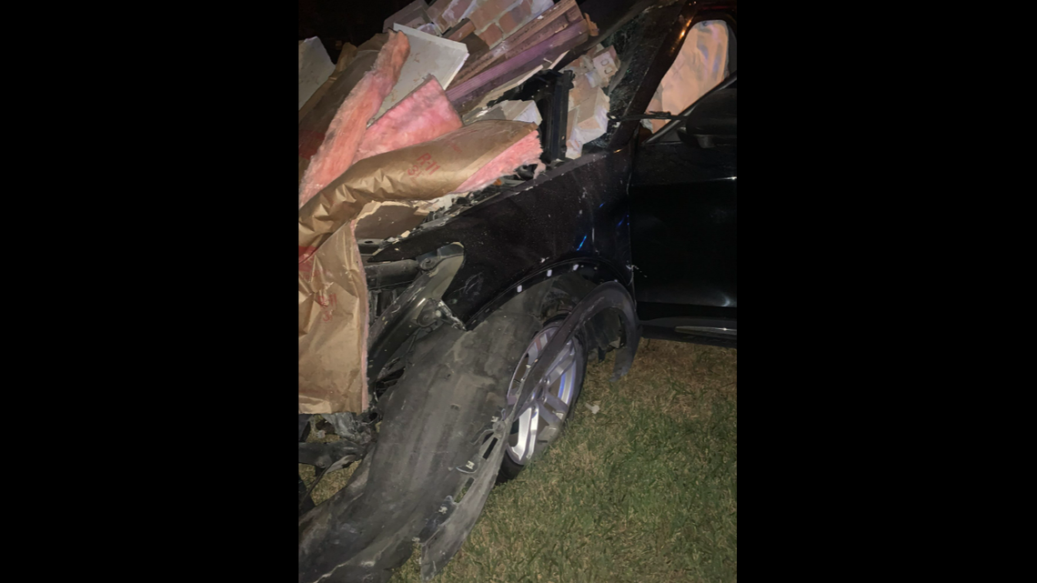 A driver is accused of fatally hitting a woman and crashing into a house near Houston, Texas authorities say.