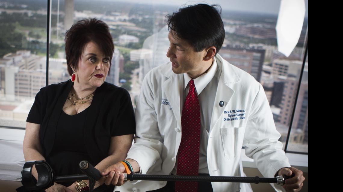 
Rhonda Johnson, 61, left, sits with Dr. Rex Marco on May 28 in Houston. Johnson underwent an extreme surgery performed by Marco, losing her leg and half her pelvis. Johnson now council other patients facing the same situation and inspiring them to fight against cancer. 
