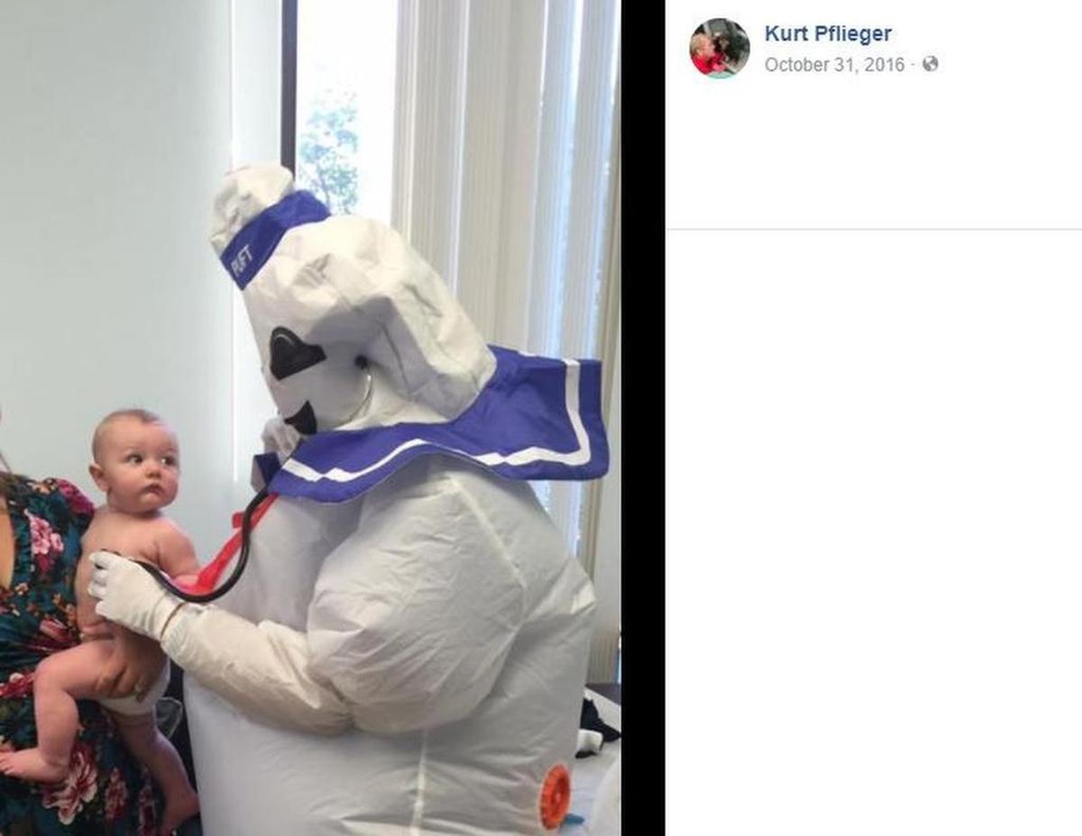 Kurt Pflieger dressed as the Stay Puft Marshmallow Man in his office for Halloween 2016.