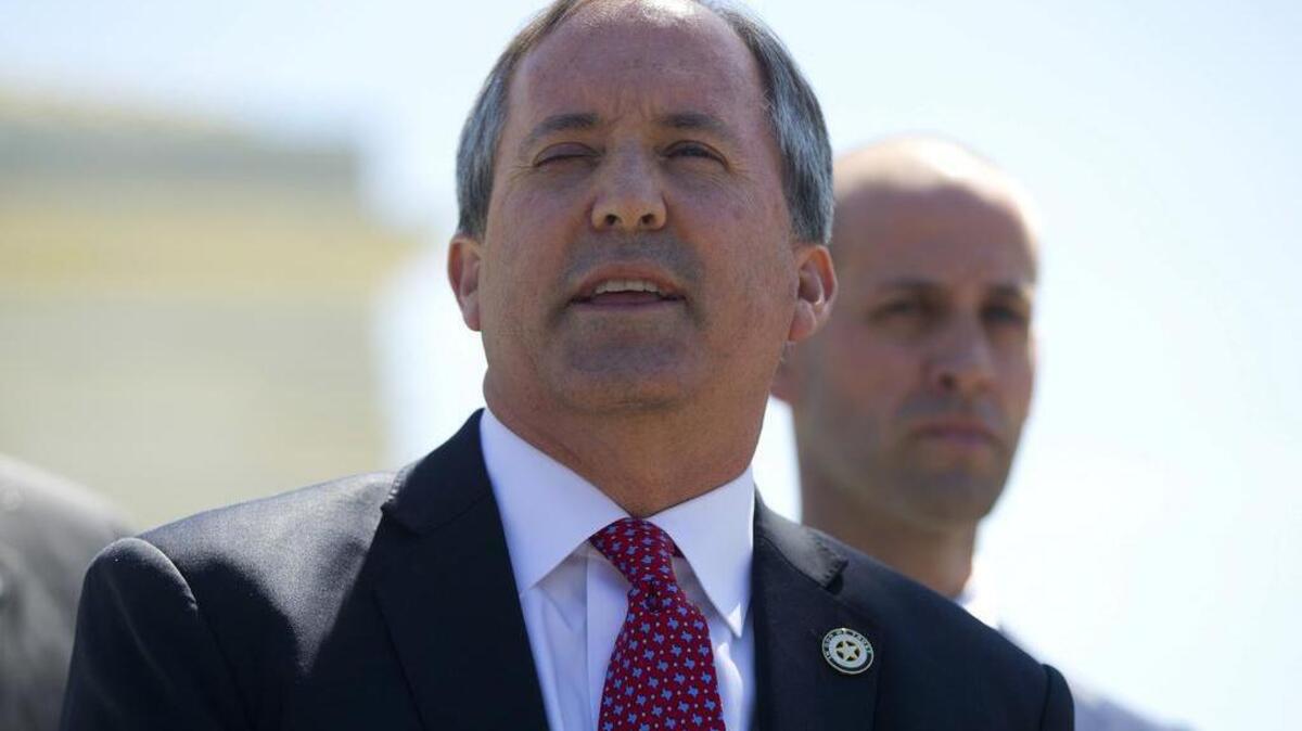 Attorney General Ken Paxton accepted $100,000 for his criminal defense fund from the head of a medical imaging provider under investigation by the attorney general’s Medicaid fraud division.