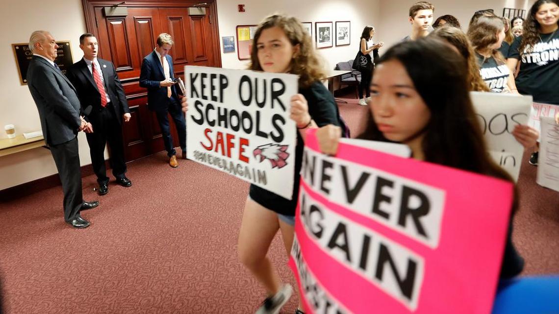 Student survivors from Marjory Stoneman Douglas High School, where 17 students and faculty were killed in a mass shooting on Feb. 14, walk past a committee room to talk to legislators at the state Capitol regarding gun control legislation, in Tallahassee, Fla., Wednesday.
