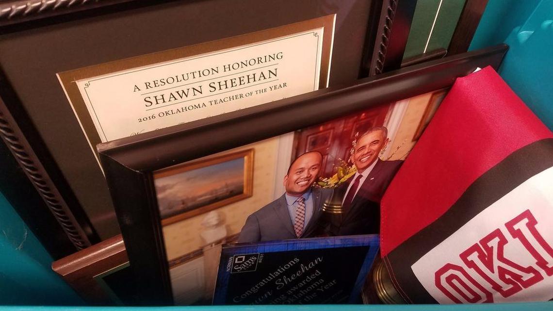 Shawn Sheehan’s teaching awards, including for 2016 Oklahoma Teacher of the Year, sit packed away in a plastic bin for his move from Norman, Okla., to Lewisville last week.