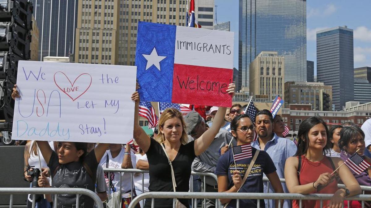 A large crowd gathers at Dallas City Hall after the Mega March in downtown Dallas. A tough Texas anti-“sanctuary cities” bill that threatens to throw county sheriffs and small-town constables in jail if they refuse to help enforce federal immigration law looks to be on the fast track toward passage in the state’s Republican-controlled Legislature.