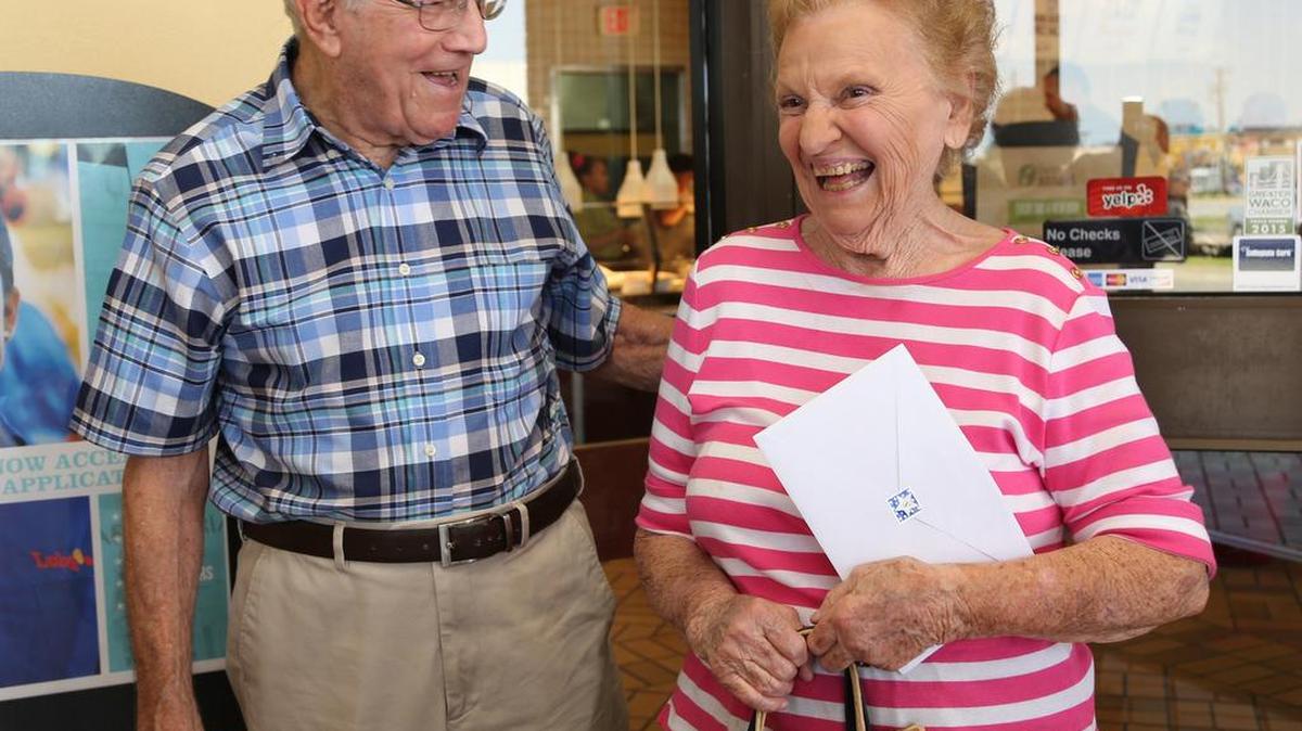 
Robert Storey Jr., 95, left and Jeanette Gooch Green, 90, right, reunite after 70 years at a restaurant Thursday in Bellmead.
