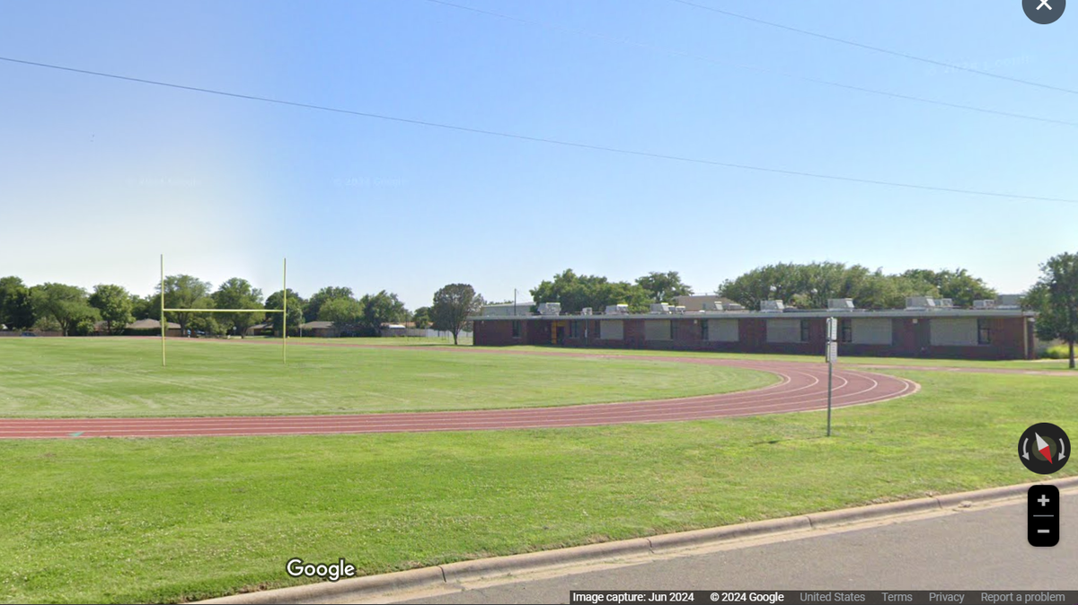 Thirteen cheerleaders were burned after a teacher punished them by making them do bear crawls on a hot track.