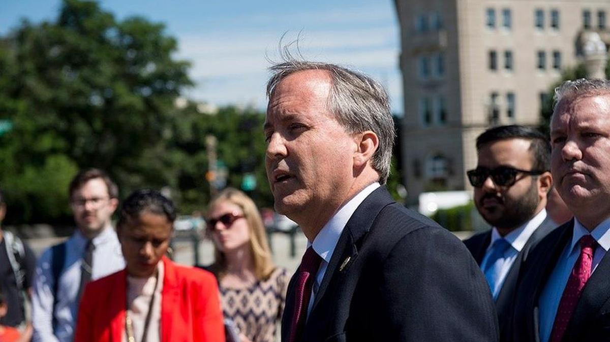 Texas Attorney General Ken Paxton holds a news conference in June in front of the U.S. Supreme Court to discuss the filing of a lawsuit against the state of Delaware.