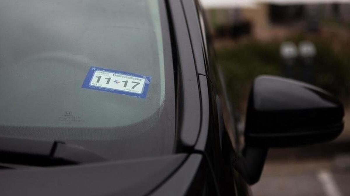A vehicle with a Texas registration sticker
