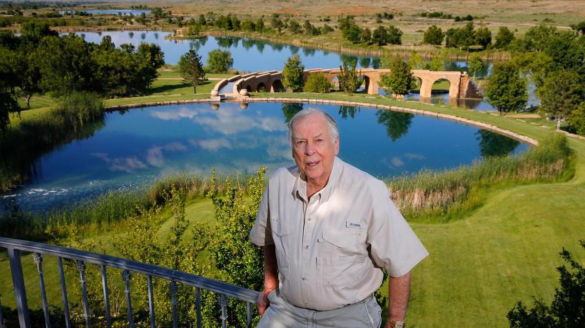 T. Boone Pickens stands before a series of man-made lakes on his Mesa Vista Ranch in the Texas Panhandle in May. Pickens on Wednesday announced he’s putting the property up for sale.