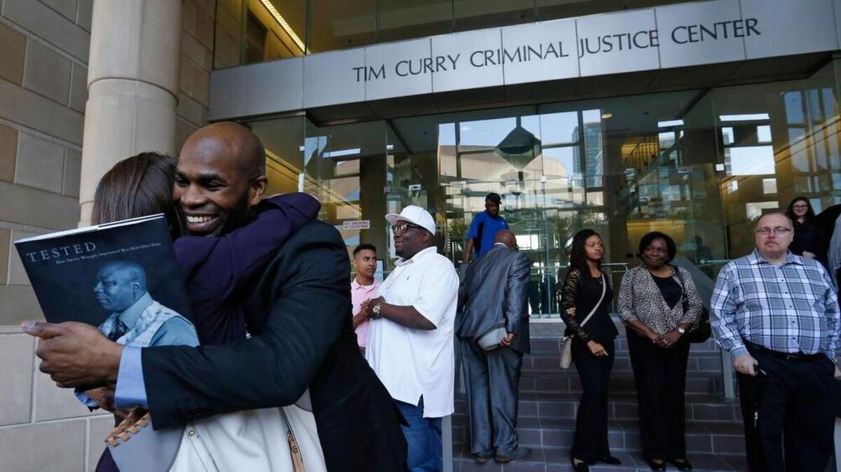 Attorney Nina Morrision gets a hug from John Nolley after the Bedford man was released from custody after 19 years behind bars on May 17, 2016 in Fort Worth due to efforts by The Innocence Project. Nolley had been found guilty of murder in 1998.