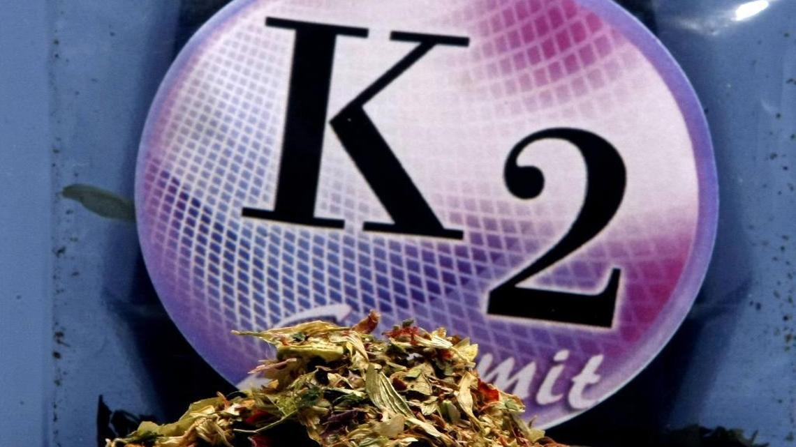 Medics in Austin have taken at least a dozen people from the intersection of East Sixth and Neches streets to treat them for symptoms related to the ingestion of the synthetic drug K2.