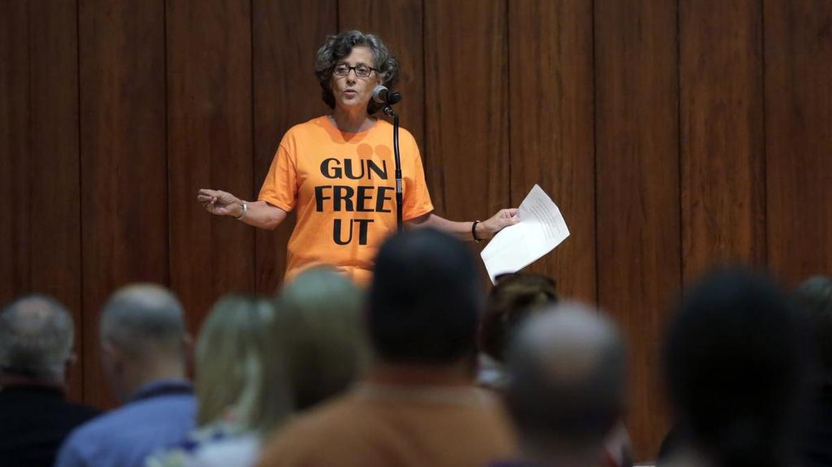 FILE: In this Wednesday, Sept. 30, 2015, file photo, professor Joan Neuberger speaks during a public forum as a special committee studies how to implement a new law allowing students with concealed weapons permits to carry firearms into class and other campus buildings, which will take effect in August 2016, in Austin, Texas. Despite a federal law requiring them to have detailed emergency plans, colleges across the country vary widely in how they prepare for campus shootings and inform their staffs and students. (AP Photo/Eric Gay, File)