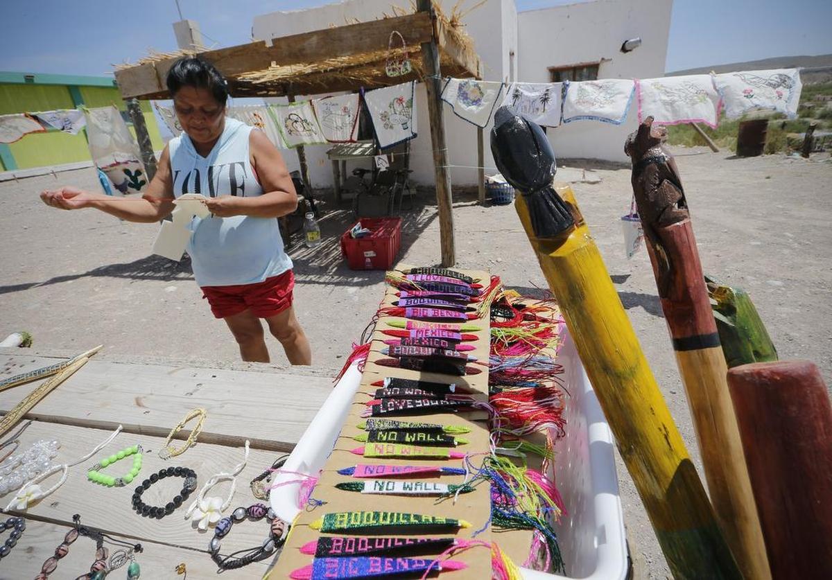 Elida Meza sews a beer koozie to sell to tourists in Boquillas del Carmen, across the river from Big Bend National Park.
