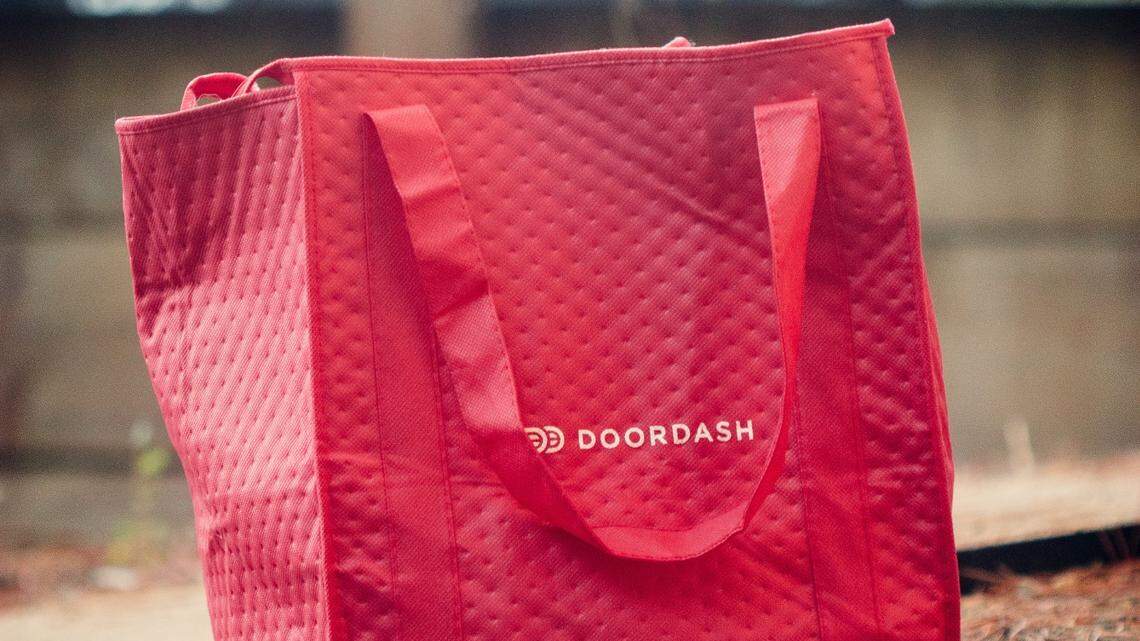 A DoorDash driver accused of attacking a restaurant manager has been arrested, police said. 