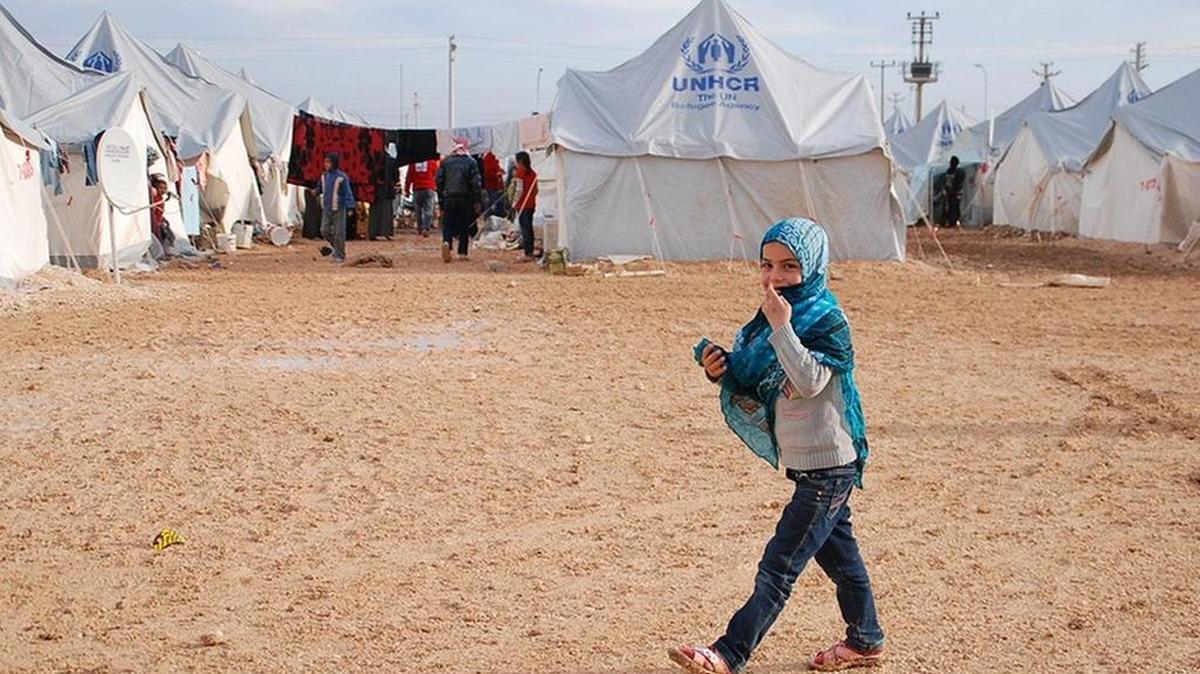 A child walks in a United Nations refugee camp in Turkey where thousands of Syrian refugees reside.