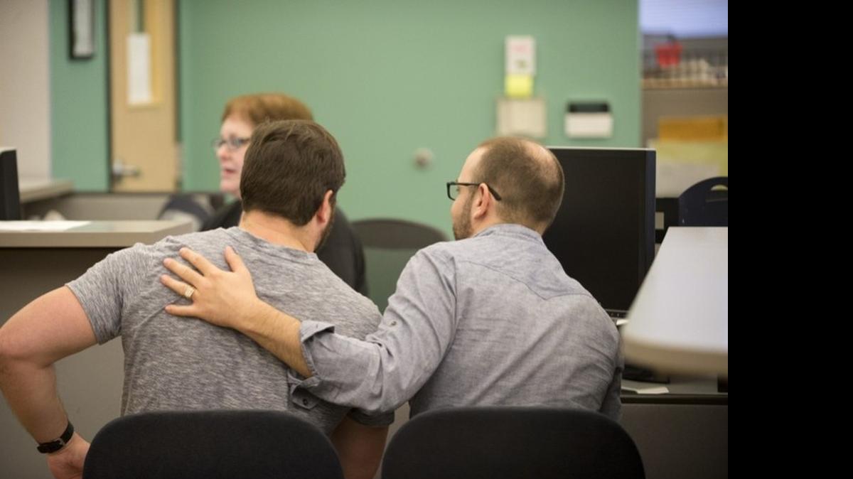 
A couple arranges a marriage license at the Travis County Clerk’s office on June 26, 2015.
