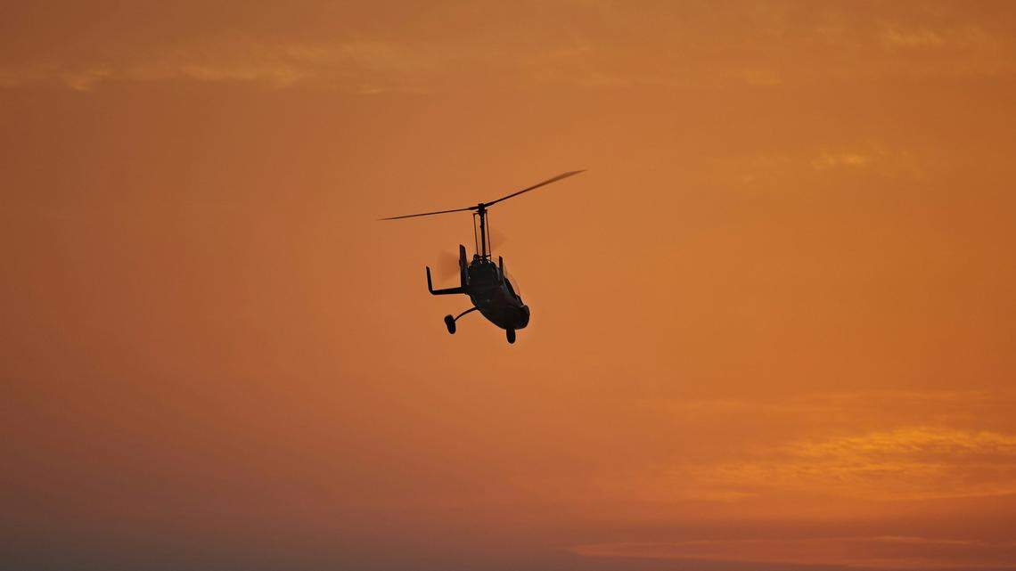 A Texas woman pointed a laser at a police helicopter, causing it to divert from a shooting in Texas, officials said.