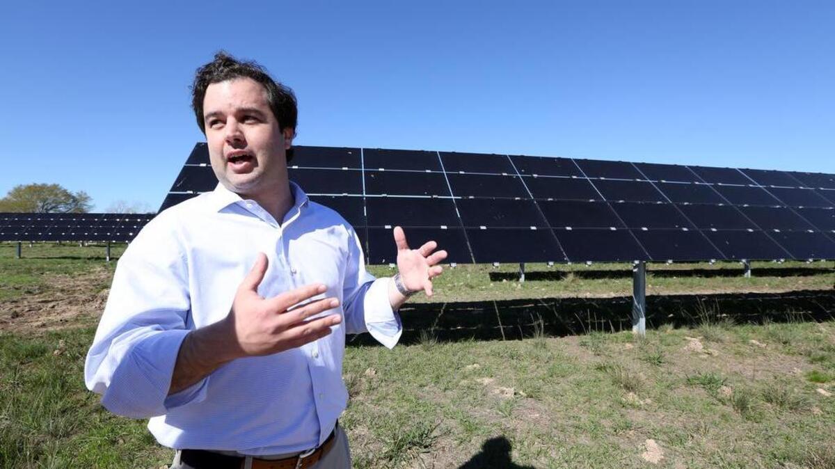 Joey Romano talks about his solar farm in Sealy on March 4. Romano’s family company, Harvest Moon Renewable Energy Co., has developed a 12-acre solar farm with more than 15,000 solar panels that will provide locally produced solar electricity to about 300 Houston-area homes.